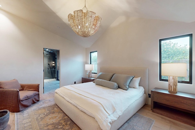 670 Santa Lucia Ave, Los Osos, CA 93402 - bedroom with light wood-type flooring, high vaulted ceiling, and a notable chandelier