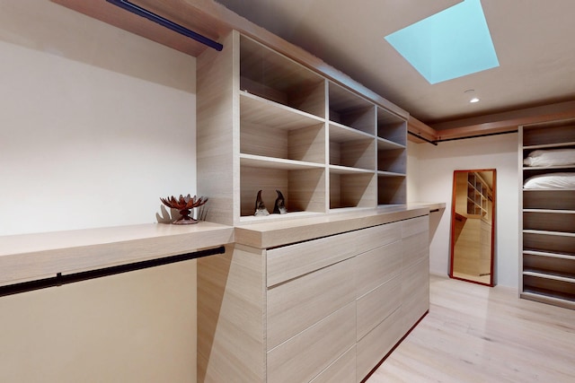 670 Santa Lucia Ave, Los Osos, CA 93402 - walk in closet with light wood-type flooring and a skylight