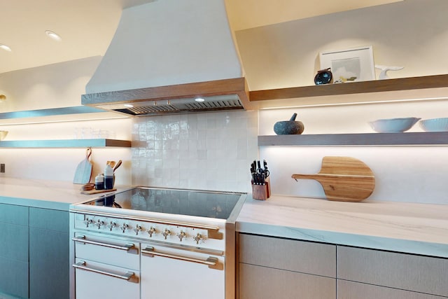 670 Santa Lucia Ave, Los Osos, CA 93402 - kitchen featuring open shelves, decorative backsplash, light stone countertops, double oven range, and premium range hood