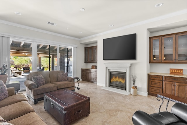 living room with ornamental molding