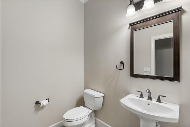 bathroom with sink and toilet