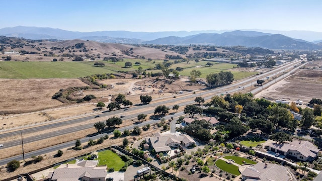 drone / aerial view featuring a mountain view