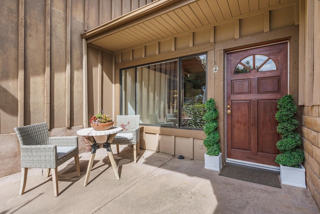 property entrance with board and batten siding