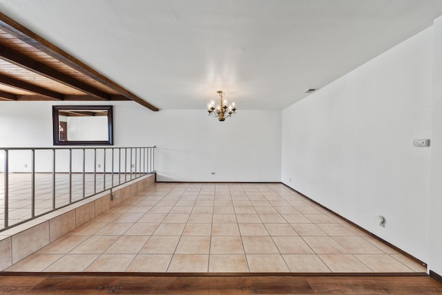 unfurnished room featuring visible vents, a healthy amount of sunlight, a chandelier, beam ceiling, and light tile patterned flooring