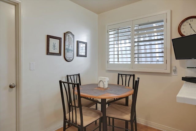 dining room with baseboards