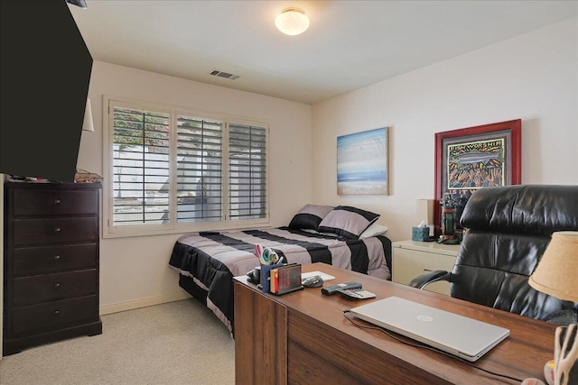 bedroom featuring light carpet, visible vents, and baseboards