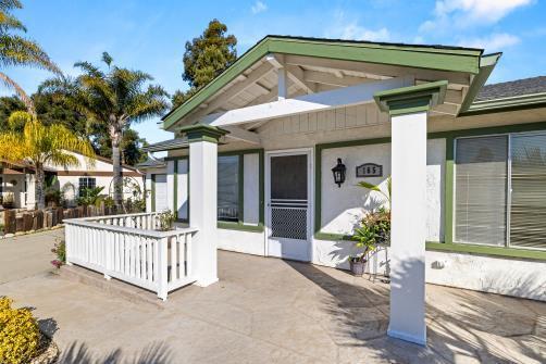 entrance to property featuring stucco siding