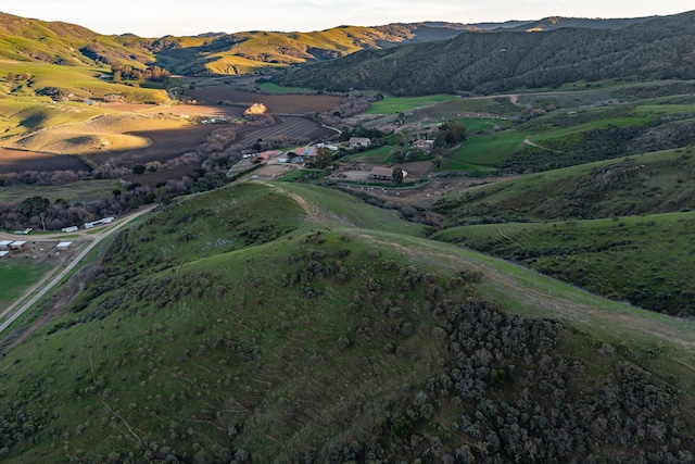 aerial view featuring a rural view and a mountain view