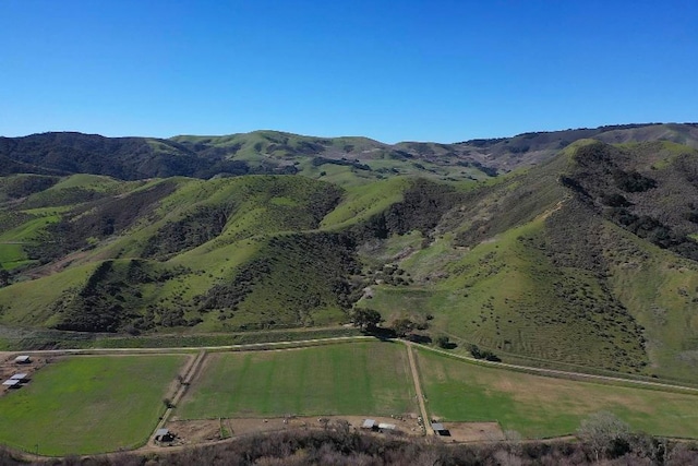 view of mountain feature with a rural view