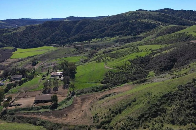 view of mountain feature with a rural view