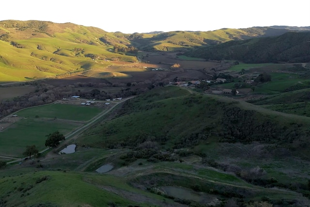 view of mountain feature with a rural view