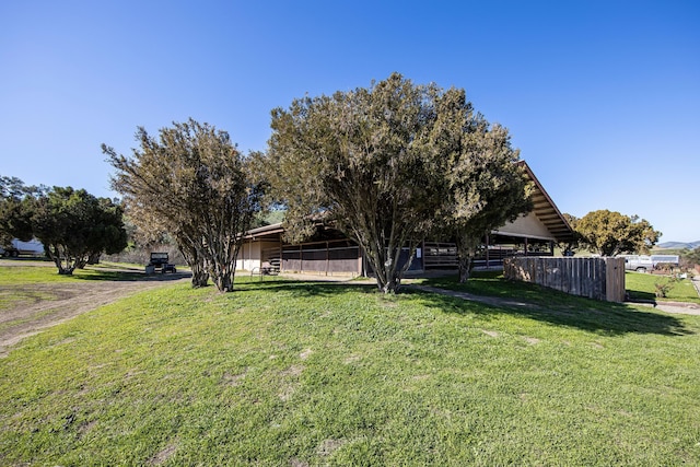 view of yard with fence