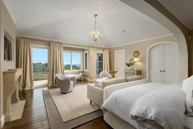 771 Garden Ln, Montecito, CA 93108 - bedroom with ornamental molding, lofted ceiling, dark wood-style flooring, and an inviting chandelier