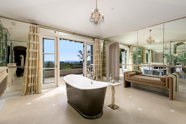 771 Garden Ln, Montecito, CA 93108 - sunroom / solarium featuring arched walkways, a chandelier, and french doors