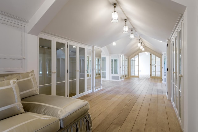 771 Garden Ln, Montecito, CA 93108 - hallway featuring vaulted ceiling, french doors, rail lighting, and light wood-style flooring