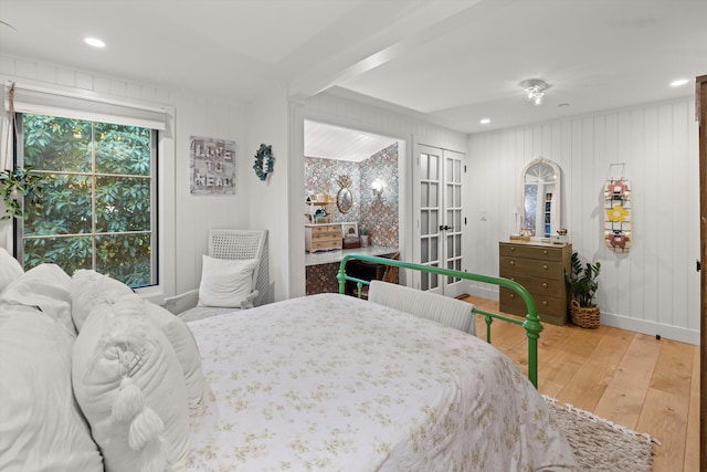 bedroom featuring light wood-type flooring, french doors, baseboards, and recessed lighting