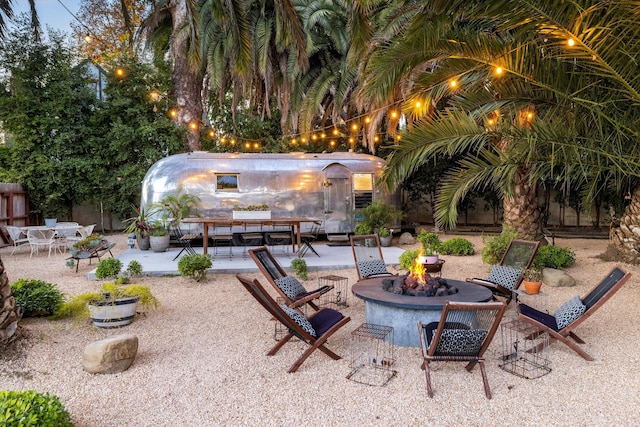 view of patio / terrace featuring a fire pit