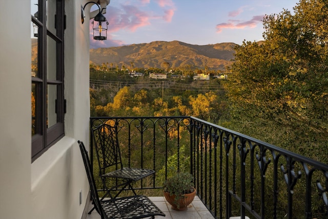 balcony featuring a mountain view