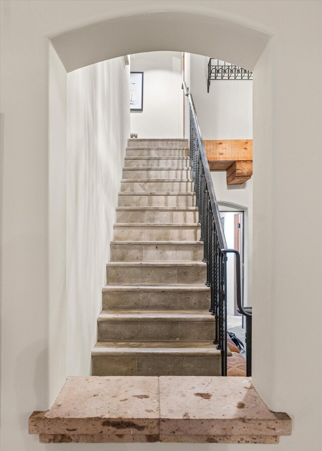 stairs featuring arched walkways