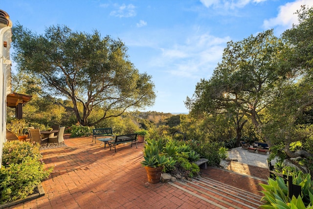 view of patio featuring outdoor dining area and an outdoor living space