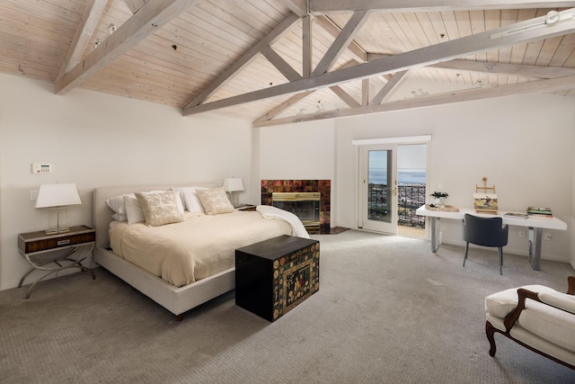 bedroom featuring vaulted ceiling with beams, a fireplace, carpet flooring, access to outside, and wooden ceiling