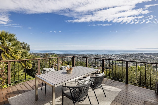 wooden deck with outdoor dining space