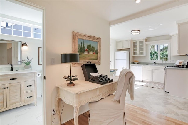 home office with a sink and recessed lighting