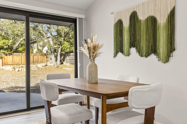 dining room with wood finished floors