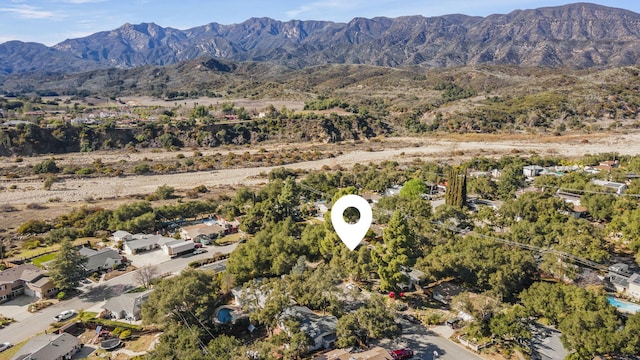 bird's eye view with a mountain view