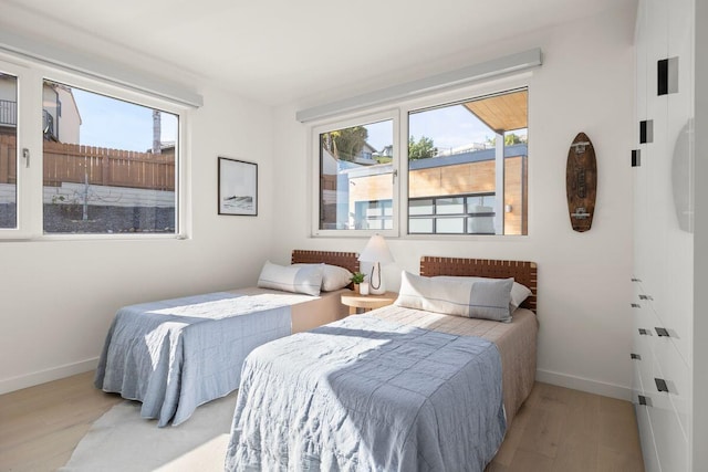 153 Nob Hill Ln, Ventura, CA 93003 - bedroom featuring baseboards and wood finished floors