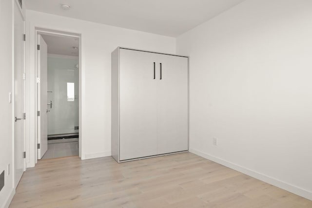 153 Nob Hill Ln, Ventura, CA 93003 - unfurnished bedroom with light wood-style flooring and baseboards