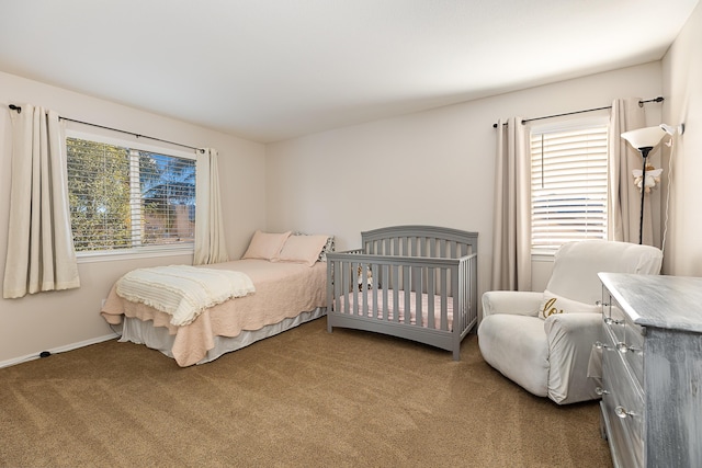 bedroom with carpet and baseboards