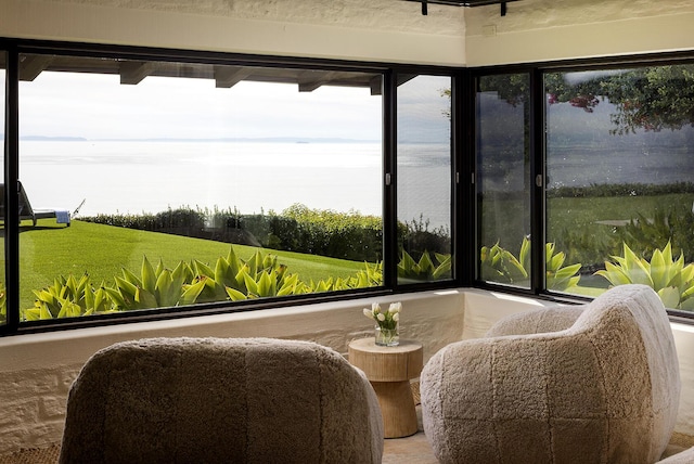 sunroom / solarium with a wealth of natural light