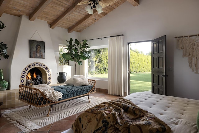 bedroom with access to exterior, wood ceiling, beam ceiling, and tile patterned floors