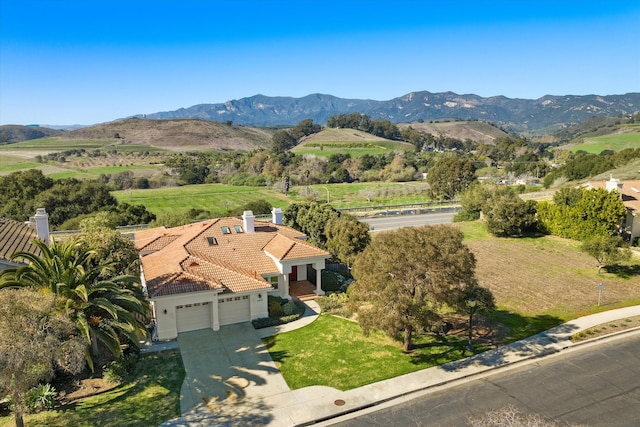 bird's eye view with a mountain view