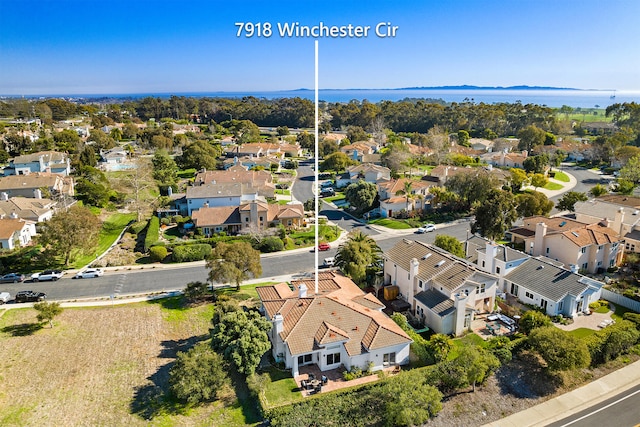 aerial view with a water view and a residential view