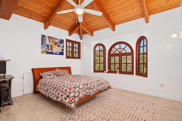 bedroom with a ceiling fan, wooden ceiling, vaulted ceiling with beams, and baseboards