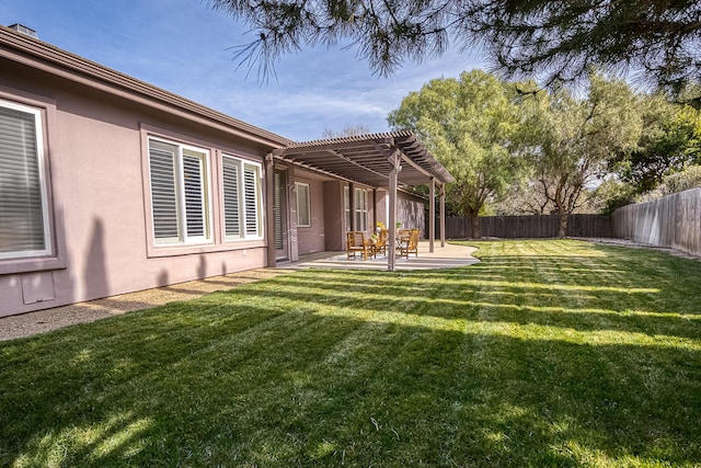 view of yard with a fenced backyard, a pergola, and a patio