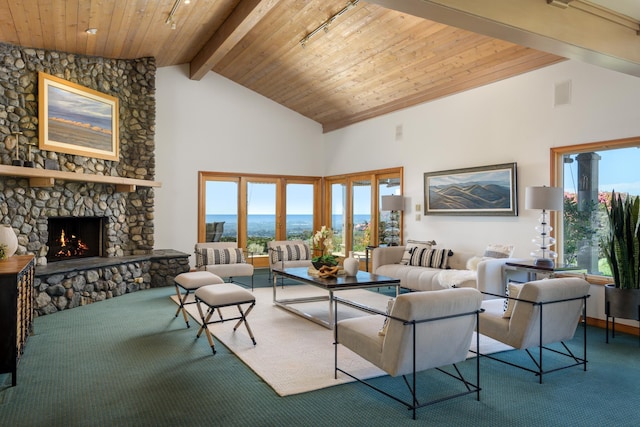 carpeted living area featuring high vaulted ceiling, a fireplace, visible vents, wood ceiling, and beamed ceiling