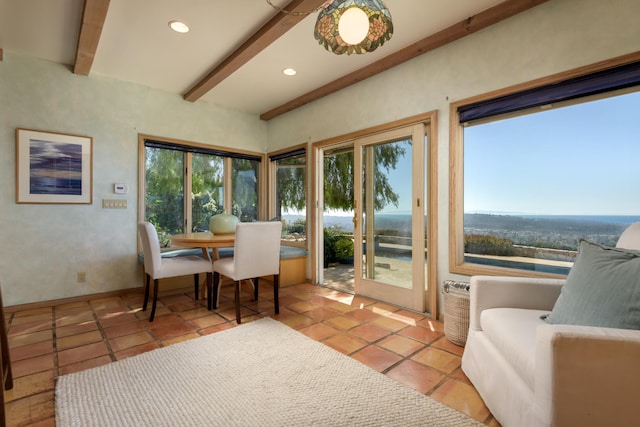 sunroom with beam ceiling