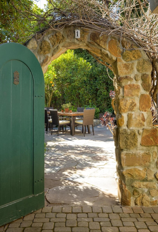 view of patio featuring outdoor dining area