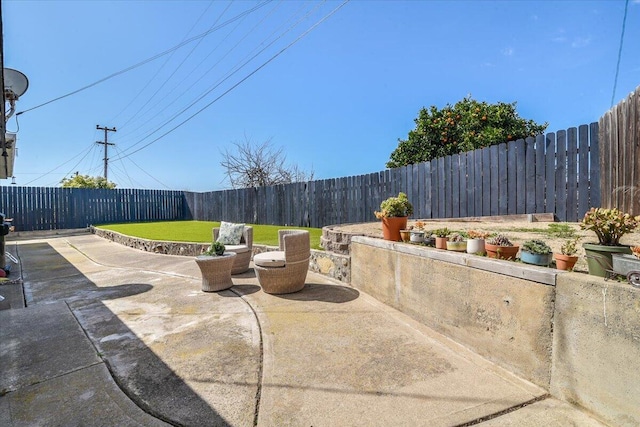 view of patio with a fenced backyard