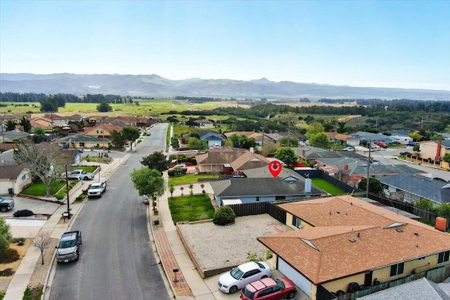 birds eye view of property featuring a residential view and a mountain view