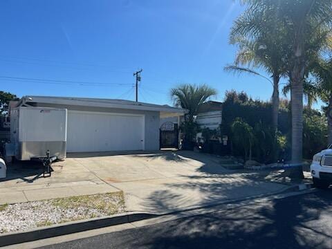 garage with driveway