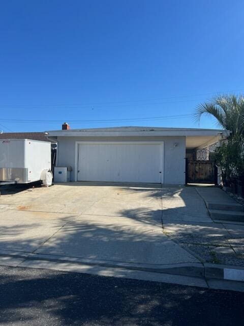 garage featuring driveway