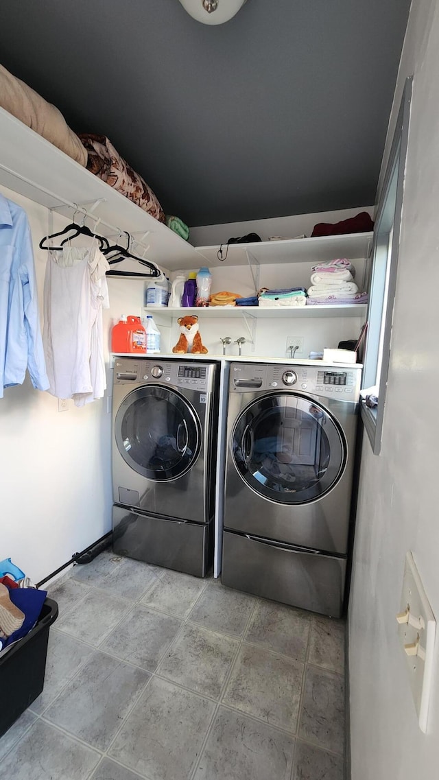 laundry area with laundry area and washer and dryer