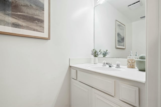 bathroom with visible vents and vanity