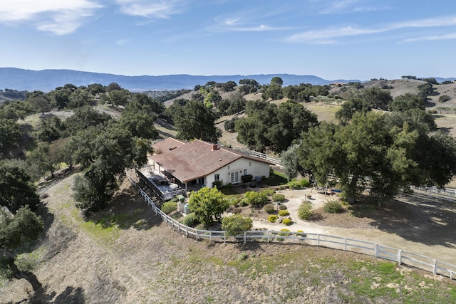 drone / aerial view featuring a mountain view