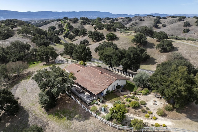 drone / aerial view featuring a mountain view