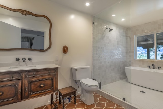 full bathroom with toilet, recessed lighting, tiled shower, and vanity